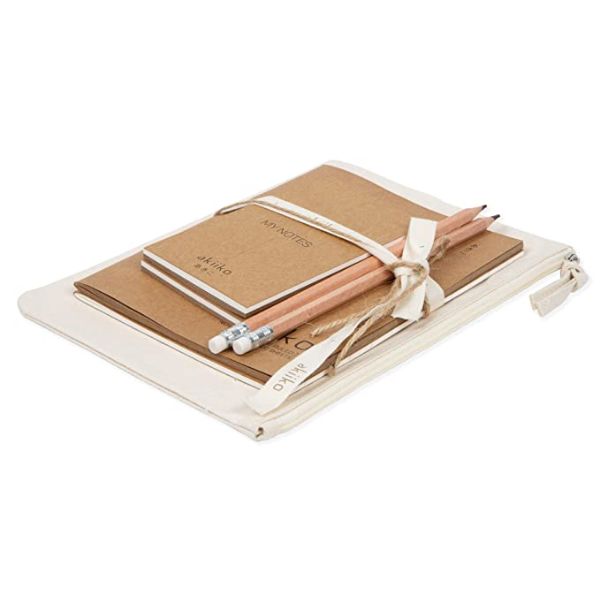 Natural coloured vegan stationery set shown wrapped in a ribbon