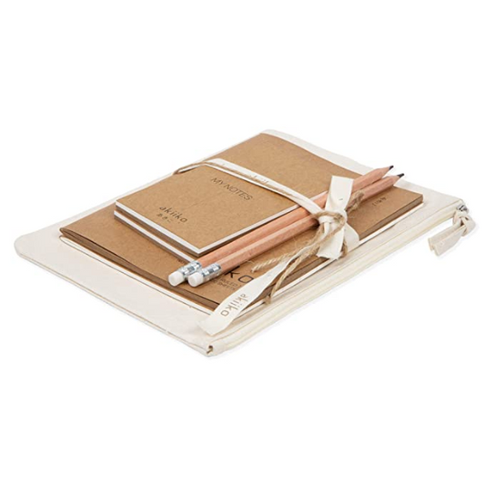 Natural coloured vegan stationery set shown wrapped in a ribbon
