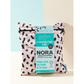 Nora reusable period pads try me pack showing the wet bag containing the pads with cardboard label