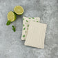 Pack of two mint kitchen smooth unsponges, shown one with mint leaf pattern side shown and one with the natural coloured side shown