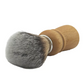 Vegan shaving brush with wooden handle, shown lying on its side and close up of the bristles