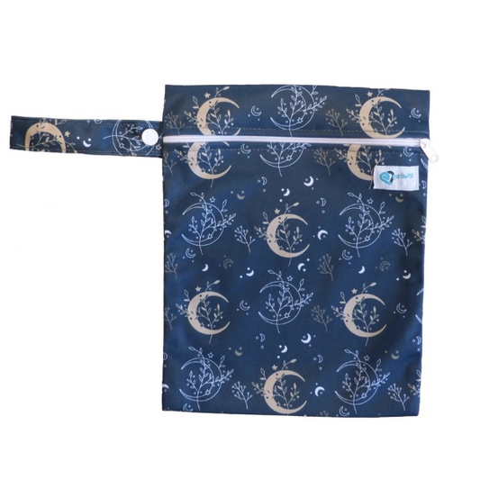 Wet bag for reusable period pads in harvest moon design (navy with crescent moons and foliage) showing hanging loop and with zip