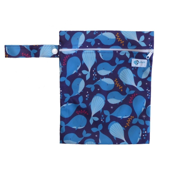 Wet bag for reusable period pads in whales design (navy with lighter blue whales) showing hanging loop and with zip