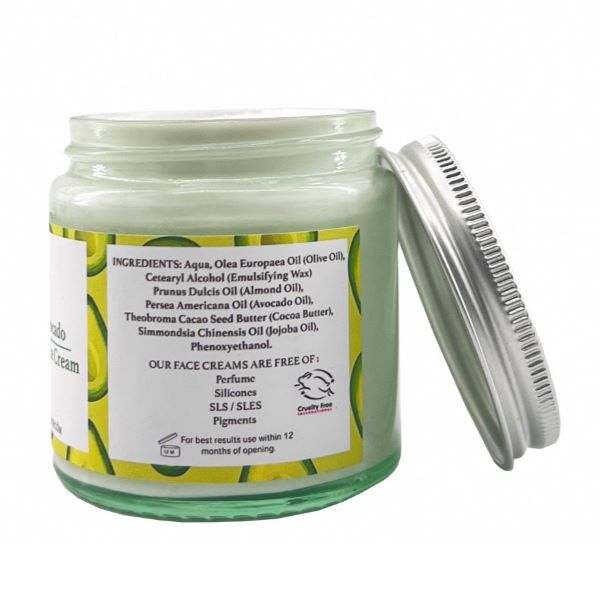 Face cream in glass jar with aluminium lid, Jojoba and avocado shown at side of jar with ingredients listed