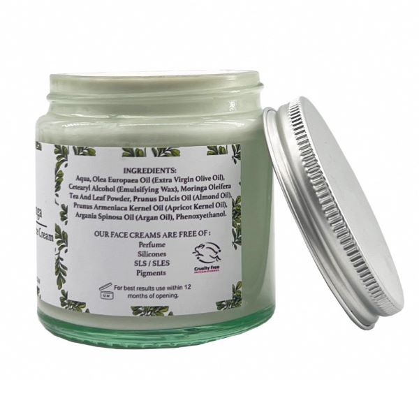 Face cream in glass jar with aluminium lid, Olive and moringa shown at side of jar with ingredients listed