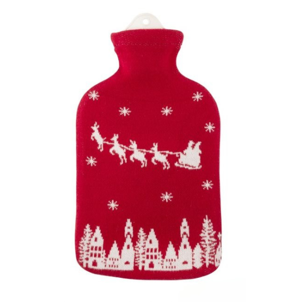 Natural rubber hot water bottle in red Santa design (knitted cover, red background with white houses and santa sleigh and reindeer flying over)