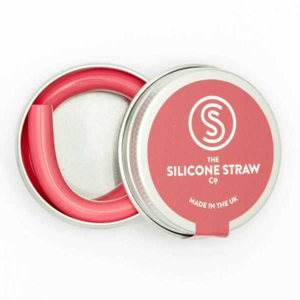 Silicone straw in rose contained in small round tin shown with lid off and straw inside