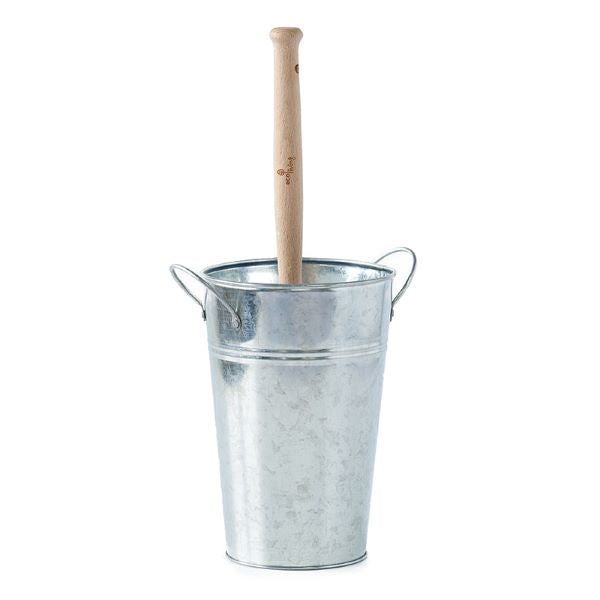 Toilet brush with wooden handle and natural brushes, shown sitting inside silver-coloured metal bucket-style holder