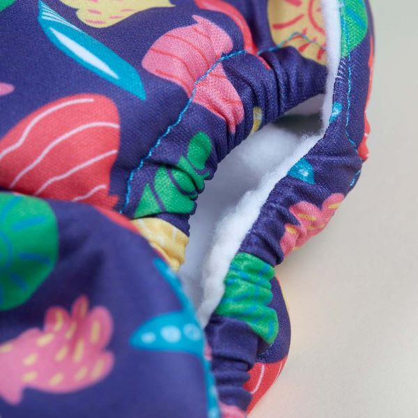 Reusable swim nappy close view of leg elastic of fastening, in Mussel Seashells design (dark blue background with colourful star fish, mussels and shells)