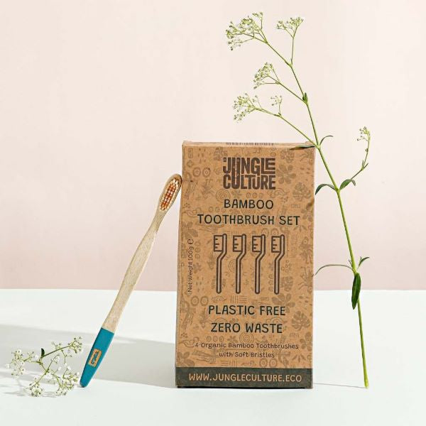 Bamboo toothbrush set of 4 cardboard packaging with one toothbrush shown