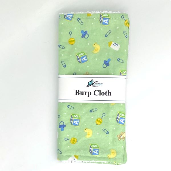 Reusable baby burp cloth in Toy time Green fabric