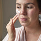 UpCircle face moisturiser being massaged into face