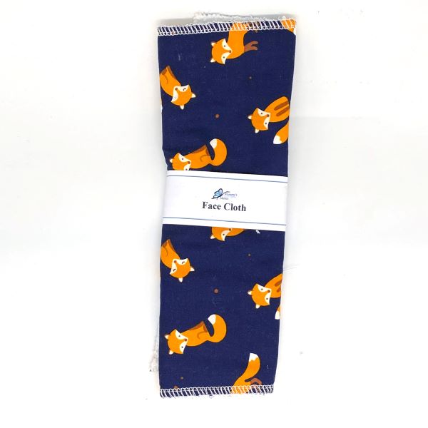 Reusable face cloth in foxes design (navy background with orange foxes)