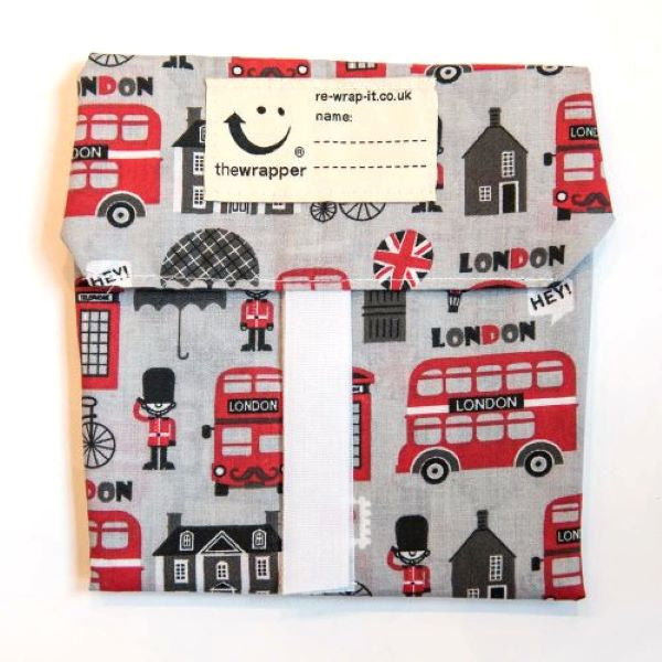 London Tourist sandwich wrapper (grey background with cartoon images of London buses, houses, bikes, flags and Scots guards)