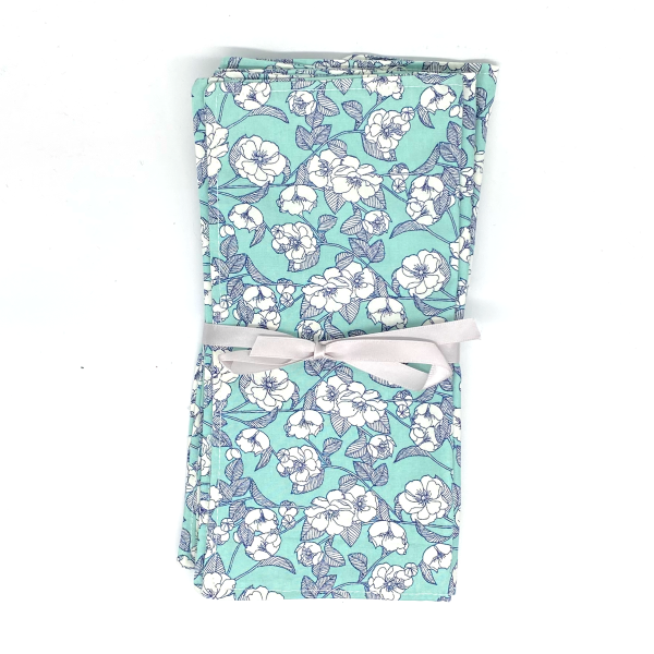 Reusable cotton napkins in Aqua flowers wrapped in ribbon
