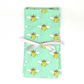 Reusable cotton napkins in Mint bee wrapped in ribbon