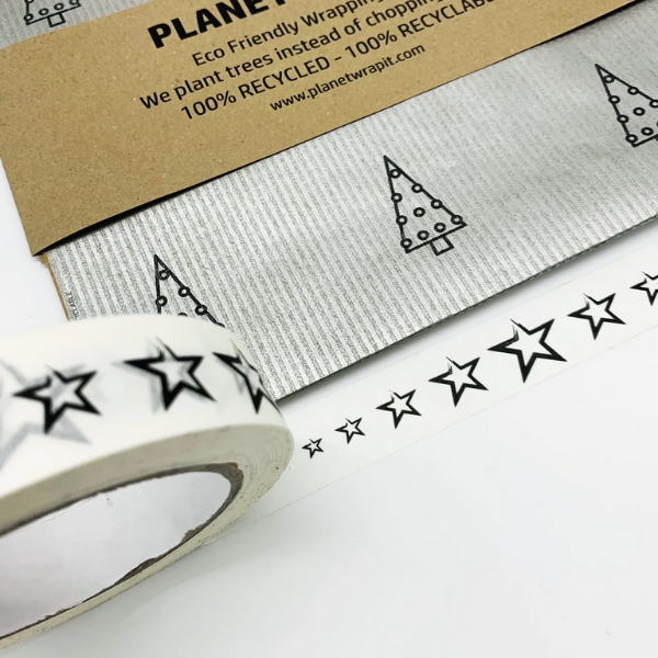 Eco-friendly paper tape (white) with black stars shown next to silver paper