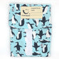 Sandwich wrapper Penguins (pale blue background with lots of black and white penguin images)
