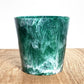 Plant pot from recycled plastic from Ocean plastic giving it a green swirl colour