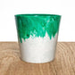 Plant pot from recycled plastic from Plastic bottle tops Green giving it a two tone colour with white at the bottom and green at the top