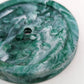 Soap dish from recycled plastic made from Ocean Plastic giving a green swirl colour 