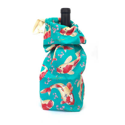 Reusable fabric bottle bag with bottle in fish design