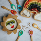 Eco-friendly bamboo baby bowl, silicone spoons and rainbow plate with food