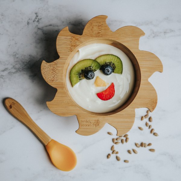 Eco-friendly bamboo baby bowl and spoon with food