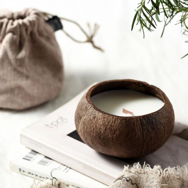 Natural eco-friendly candle in coconut shell