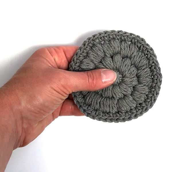Eco friendly face scrubbies grey in hand
