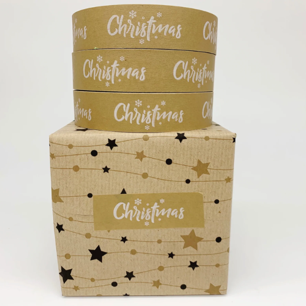 Eco-friendly paper tape Brown with white wording saying Christmas and little white snowflakes